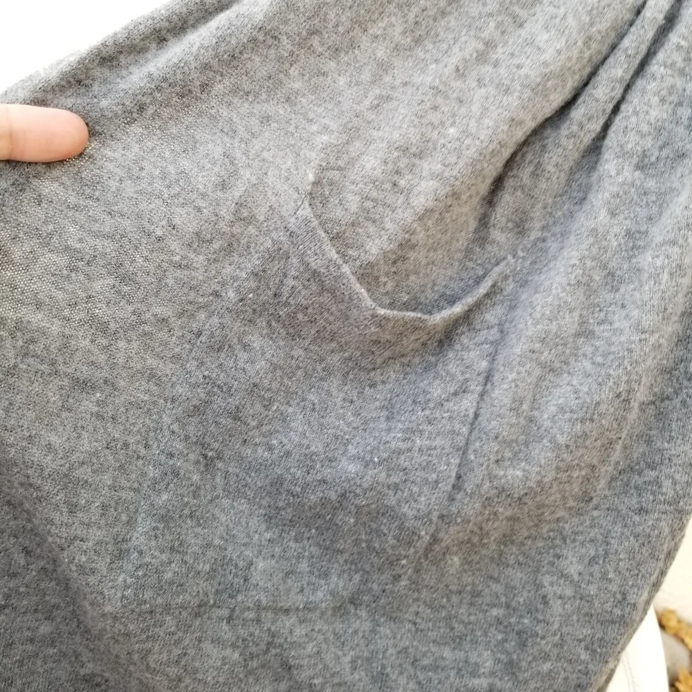 soft gray scarf with pockets and fringe